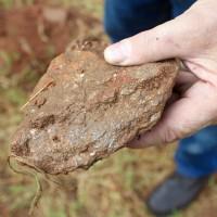 Rock sample collected at the surface of the Coosa Graphite Project resource area that is typical of the oxidized graphitic schist defining the resource